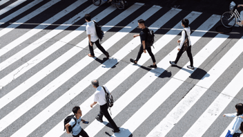 people in a crosswalk hero image