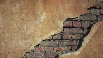 cracked brick wall hero image