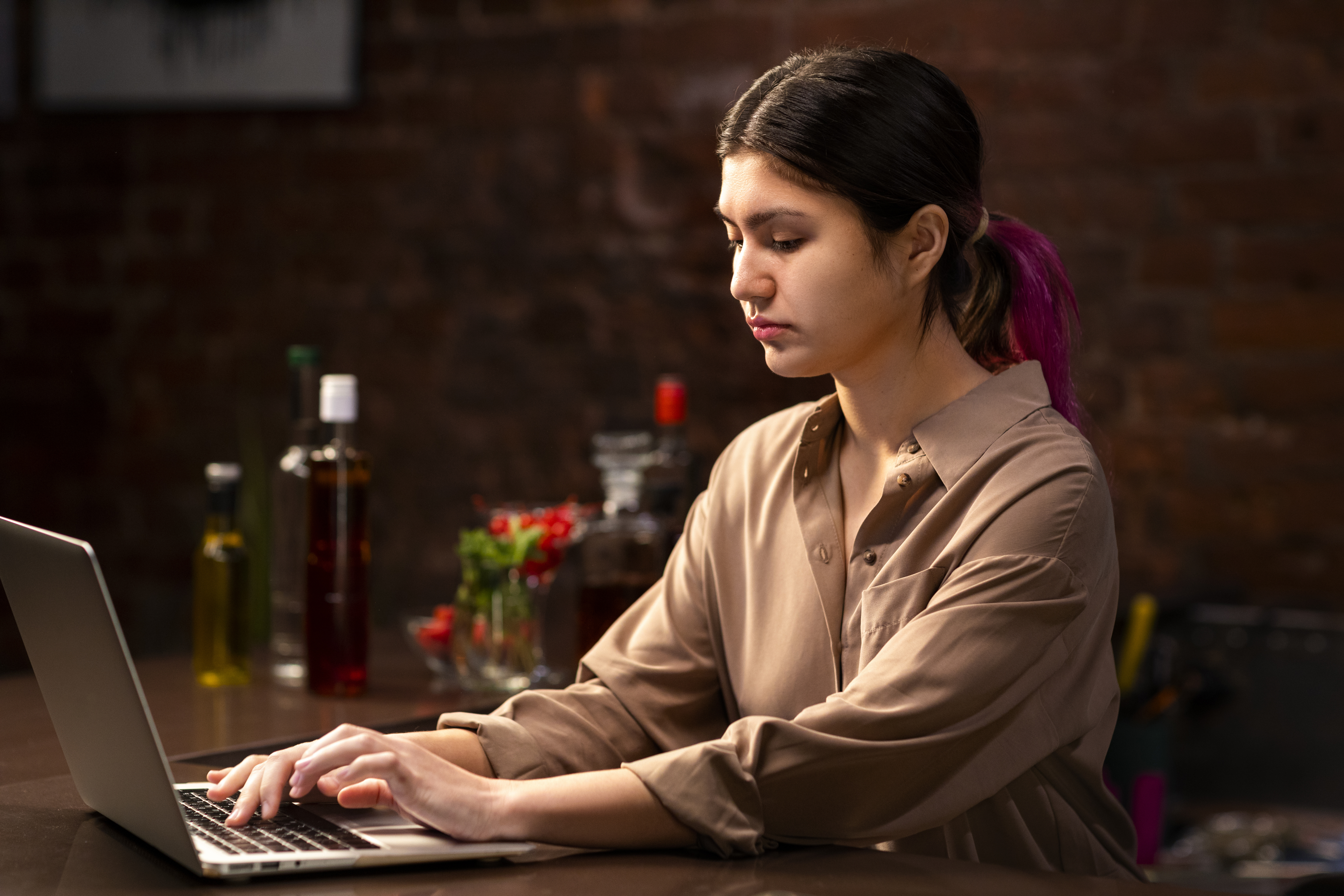 medium-shot-woman-working-with-laptop